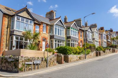 Row of houses on a residential street and street name visible, which could add value to your